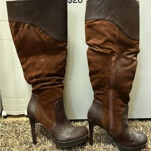 Brown leather and suede heeled boots.